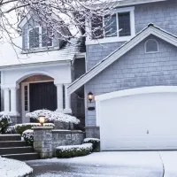 house with snow on it during the winter