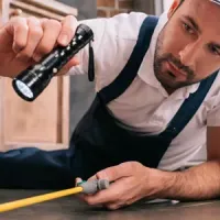 tech spraying kitchen