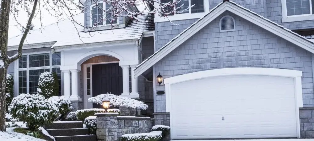 house with snow on it during the winter