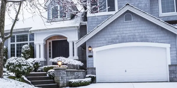 house with snow on it during the winter